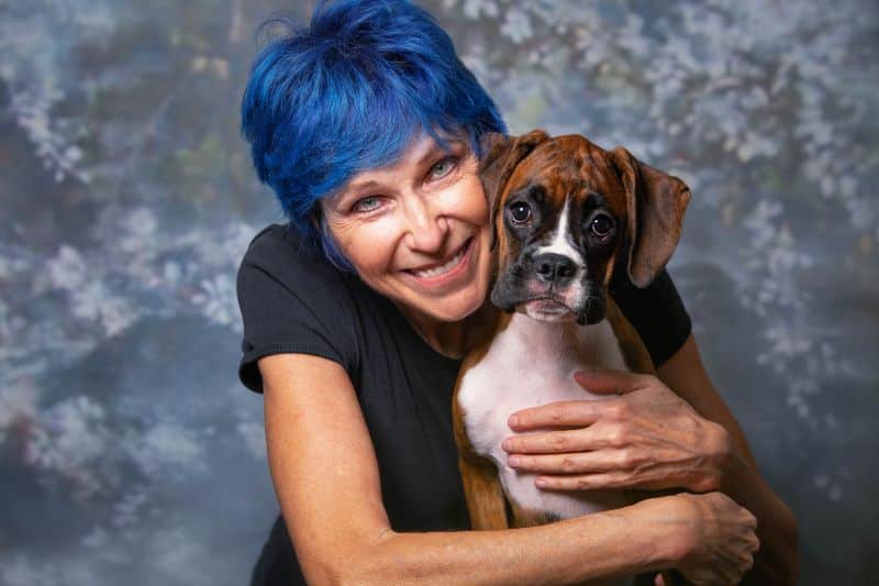 Paula Vandervoort with her Boxer.