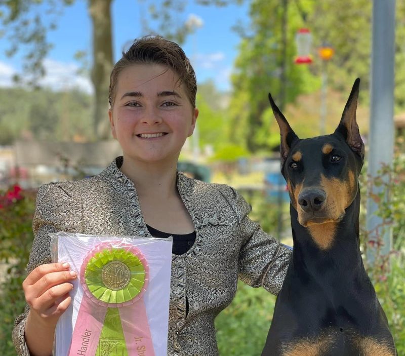 Junior Handler with her Doberman Pinscher