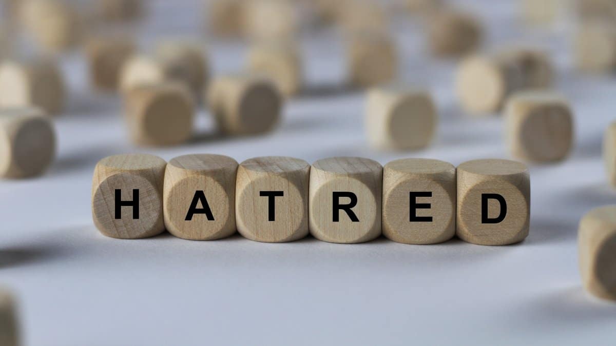 Hatred - cube with letters, sign with wooden cubes.