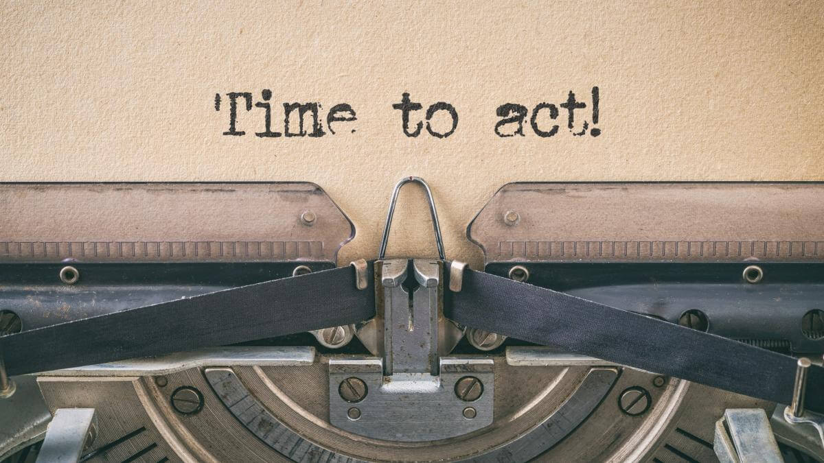 Text written with a vintage typewriter - Time to act