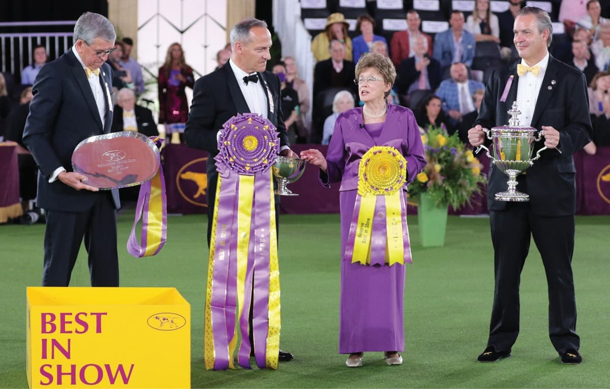 Judge Patricia Craige Trotter speaks to the crowd before awarding Best in Show. L/R David A. Heming, David W. Haddock, and Charlton Reynders, III. Judge Patricia Craige Trotter speaks to the crowd before awarding Best in Show. L/R David A. Heming, David W. Haddock, and Charlton Reynders, III.