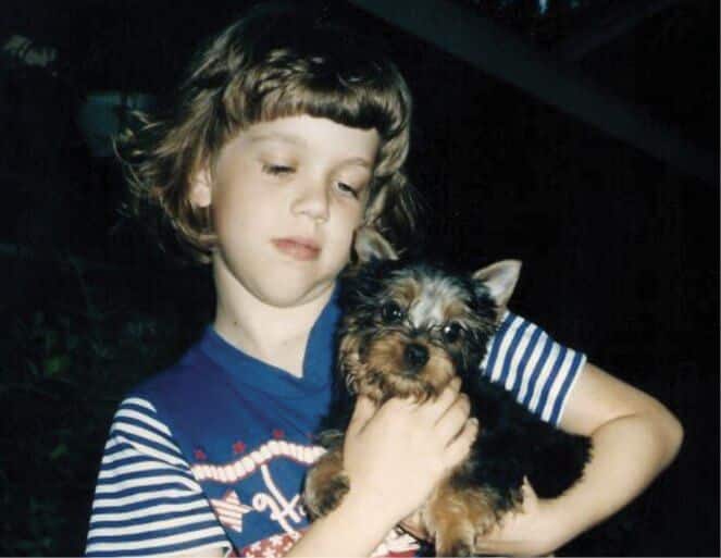 Child with a Silky Terrier
