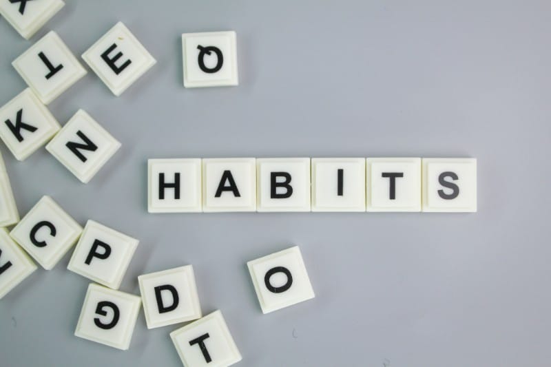 a mixture of letters of the alphabet with the word habits