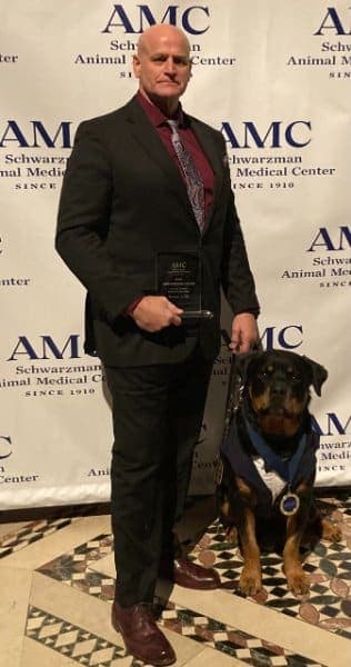 John Hunt with Therapy Dog Axel