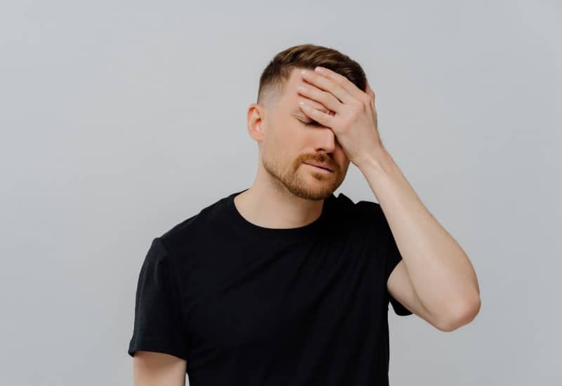disappointed man being upset because of doing an error