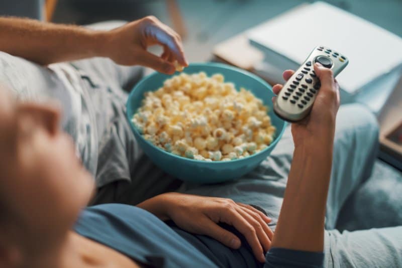 couple watching tv at home