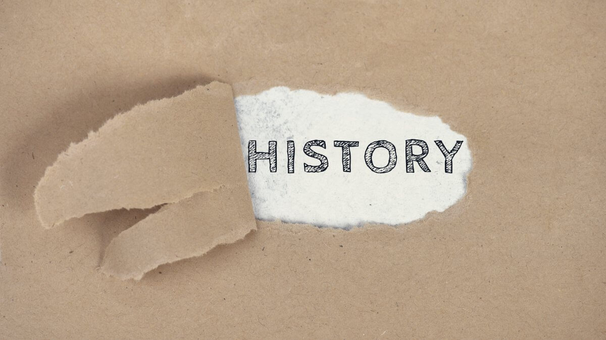 The word History on a ripped paper