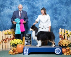 Gabriella Thornburg being awarded owner handler best in show at a dog show