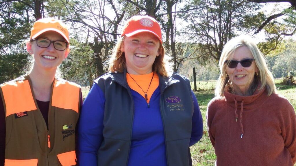 Happy Workers: Kassi McCombe - Jackie Fisher - Judy Cheshire at the first Master Hunter Excellent test.