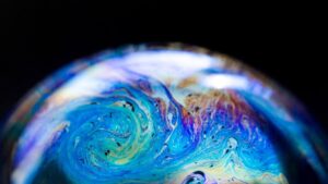 Abstract pattern, multicolored texture inside of the soap bubble, macro photography