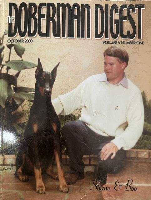A younger Shane with his first show dog, CH Korfield’s Boo Bayou (Boo).