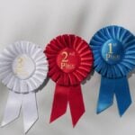 winner-success-trending-concept-three-rosette