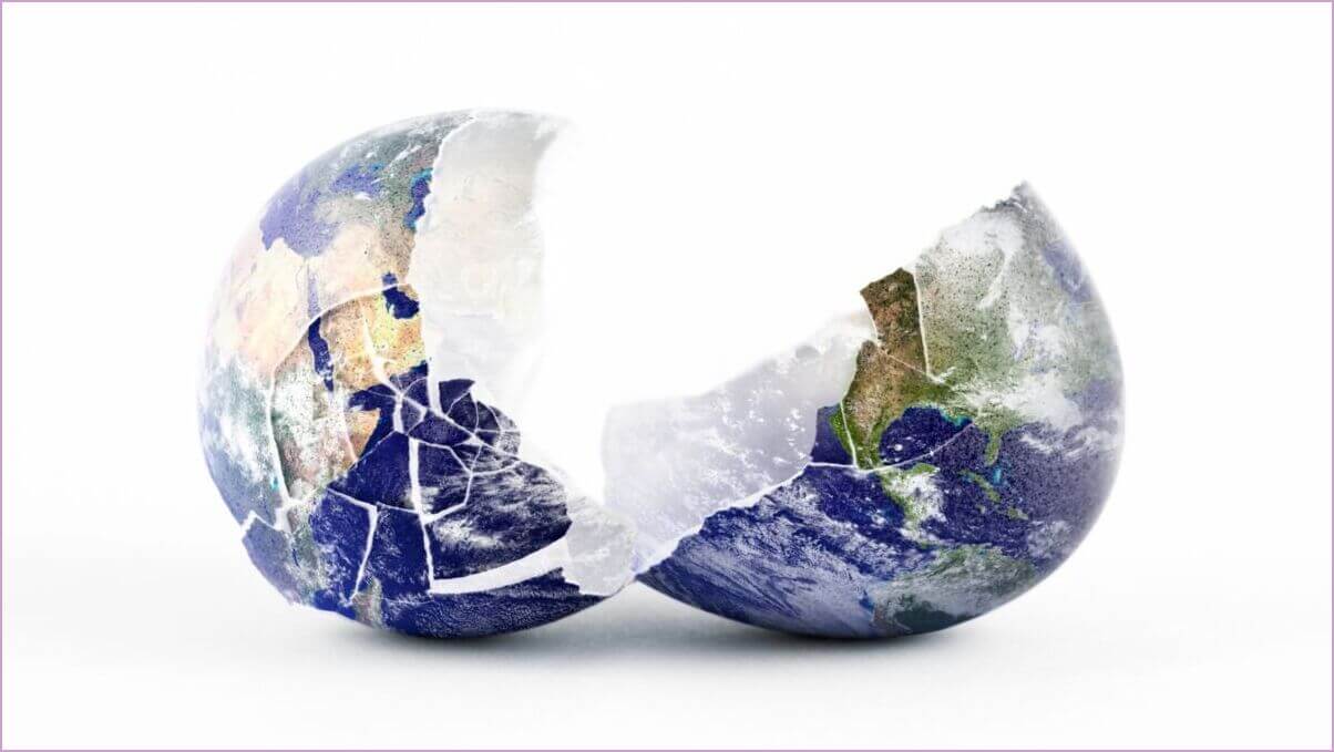 Broken world. An image of the Earth as a broken egg split in two halves.
