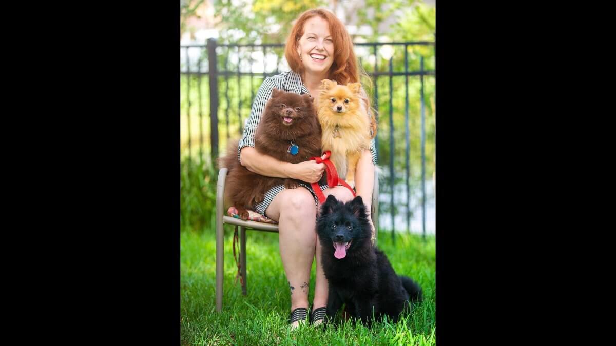 Kristina Chaput with 2 German Spitz dogs