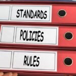 Standards, Policies, Rules, concept words. Folder concept. Ring. Ring binders. Conceptual Business.