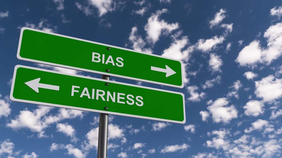 Bias fairness traffic sign on blue sky