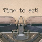 Text written with a vintage typewriter - Time to act