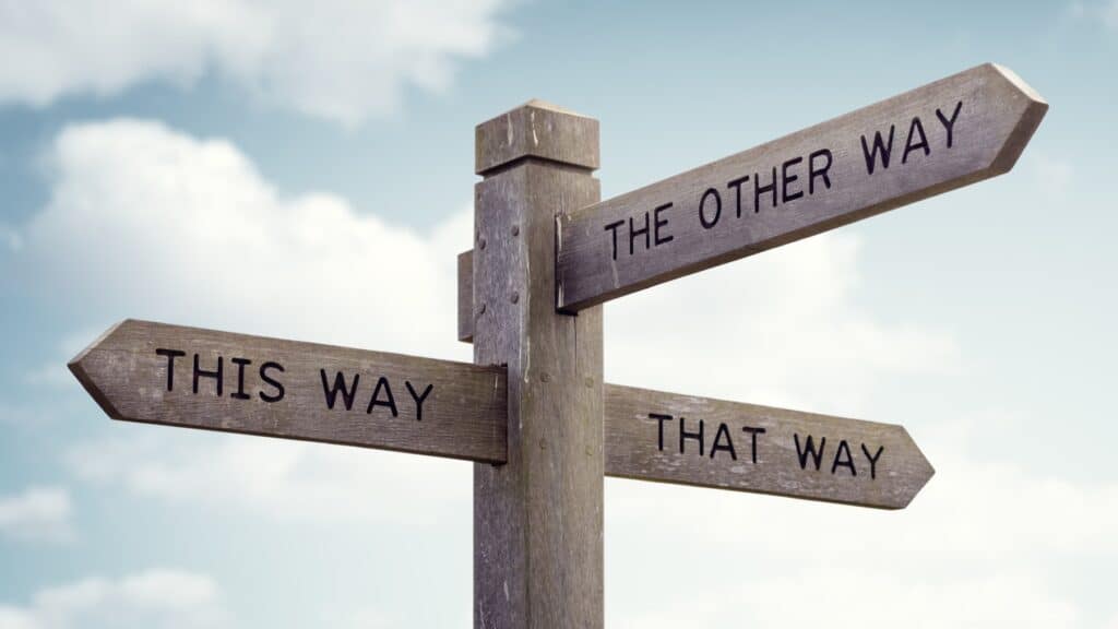 Which way to go road sign. Crossroad signpost saying this way, that way, the other way concept for lost, confusion or decisions