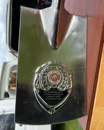 This chrome-plated spade is the perpetual trophy awarded to the Best of the Best Terrier at the F&MWTC club’s annual competition among champions.