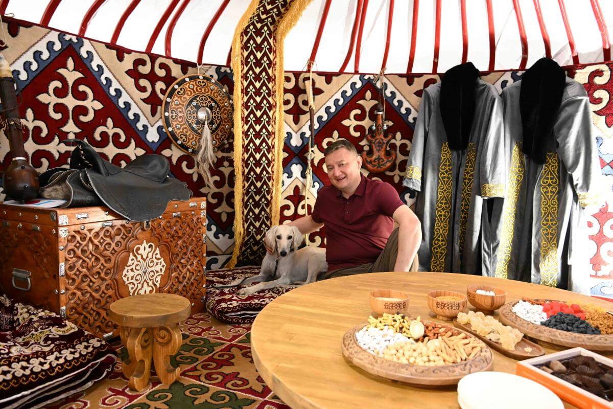 Mr. Baurzhan Serikkali, President of the Union of Cynologists of Kazakhstan (UCK), greeted visitors to a colorful yurt featuring the Kazakh Tazy.