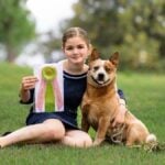 Reagan Schwartzenberger and her Juniors dog “Bourbon,” CH Rumspringa’s Know When To Hold ‘Em, bred and finished by Reagan. (photo by Laura Wright of BellaClan Border Collies)